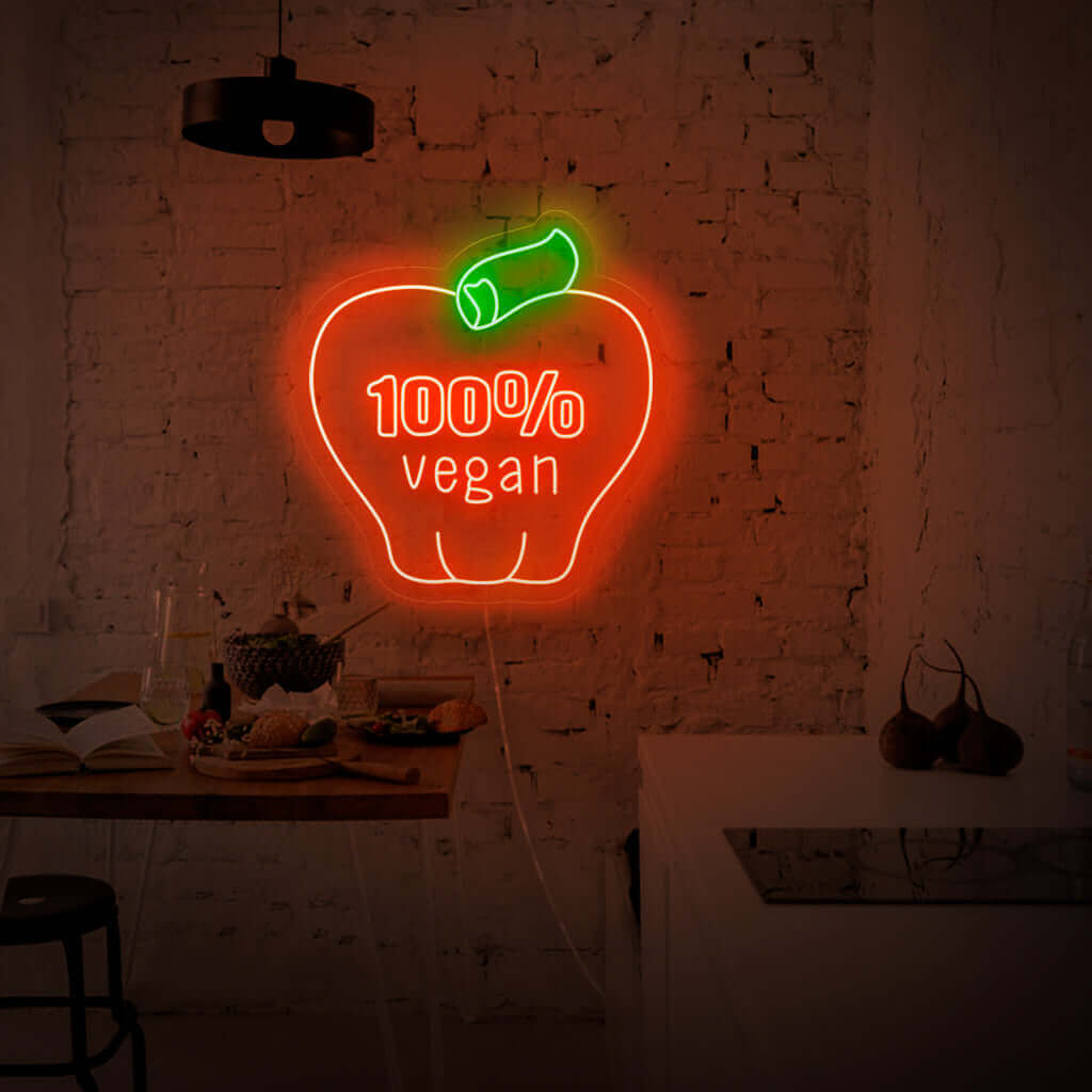 "100% Vegan With Apple Neon Sign" heeft een levendig en milieuvriendelijk ontwerp en toont met trots het appelsymbool als bewijs van uw toewijding aan een plantaardige levensstijl.