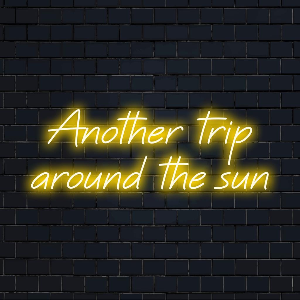 Levendig led-neonbord met de tekst 'Another Trip Around The Sun'. Perfecte neondecoratie voor verjaardagen en feesten.