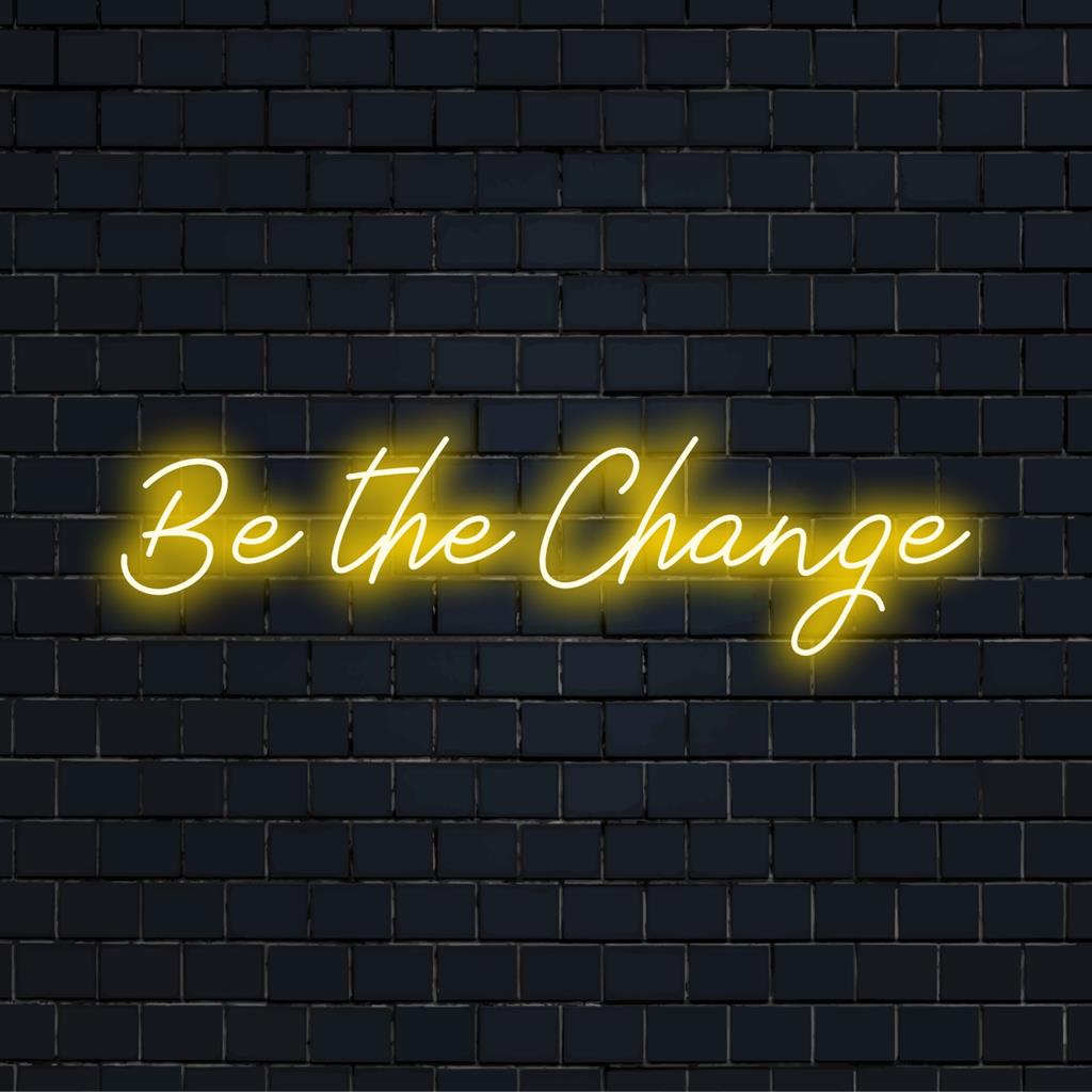 Op maat gemaakt LED-neonbord met de tekst Be The Change, perfect om inspirerende neonverlichting aan elke ruimte toe te voegen.