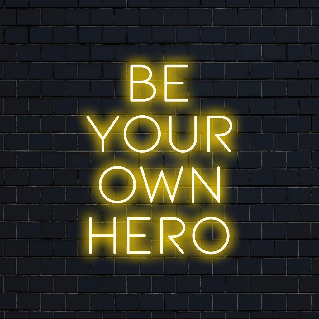 Speciaal handgemaakt LED-neonbord met de inspirerende tekst 'Be Your Own Hero'. Perfect voor een vrolijke neondecoratie.
