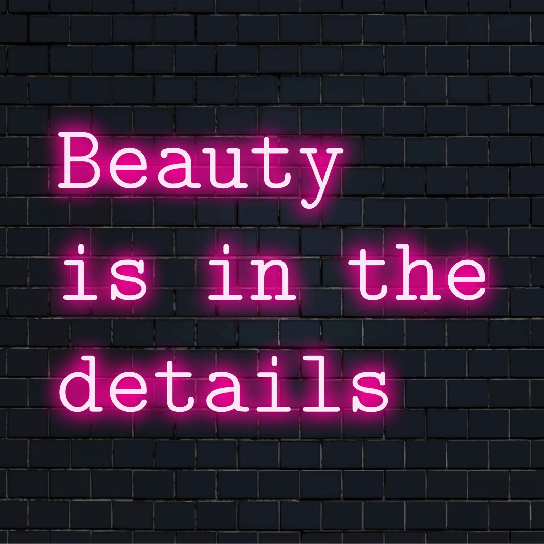 Op maat gemaakt LED-neonbord met de tekst 'Beauty Is In The Details', perfect voor het personaliseren van elke ruimte met een levendige, artistieke uitstraling.