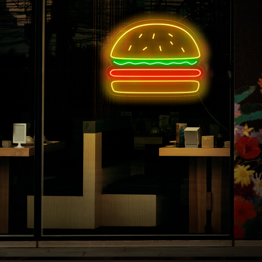 "Burger Neon Sign" - Een overheerlijk neonlicht met het iconische symbool van een hamburger. Het zorgt voor een sfeer van heerlijk eten en liefde voor klassieke fastfoodfavorieten in uw hamburgertent of restaurant.