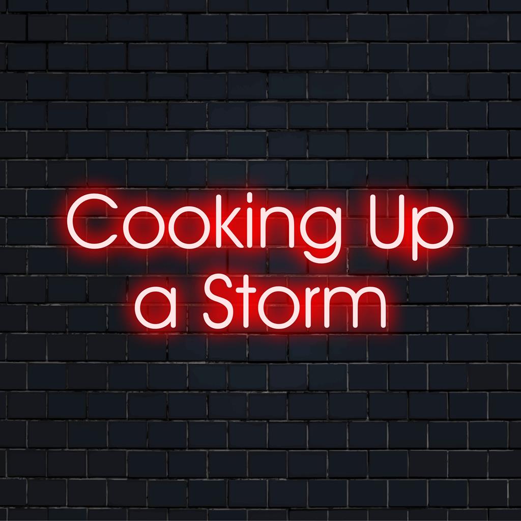 Neonreclame met de tekst 'Cooking Up A Storm', uitgevoerd in levendige ledletters. Perfect voor in de keuken.