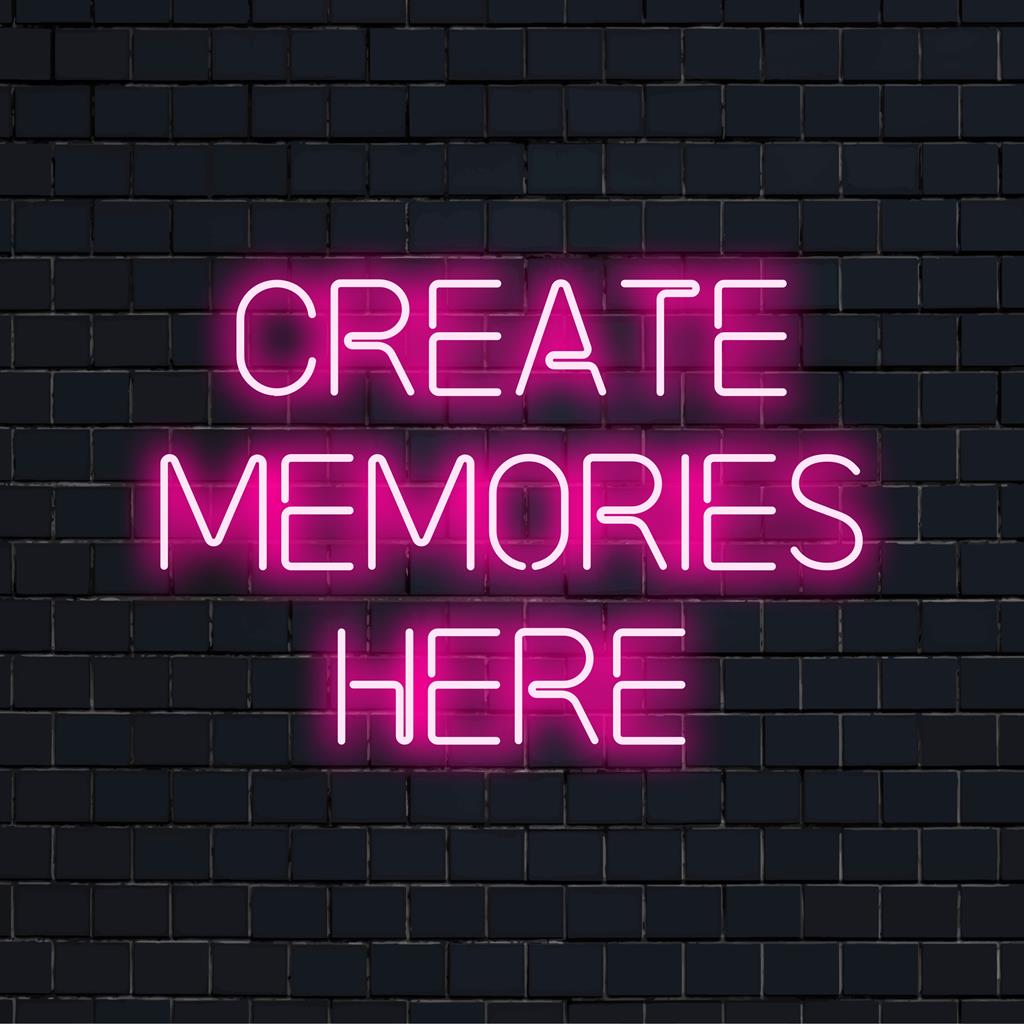 Aangepast LED-neonbord met de tekst Create Memories Here in levendige letters, perfect voor het creëren van een persoonlijke sfeer.