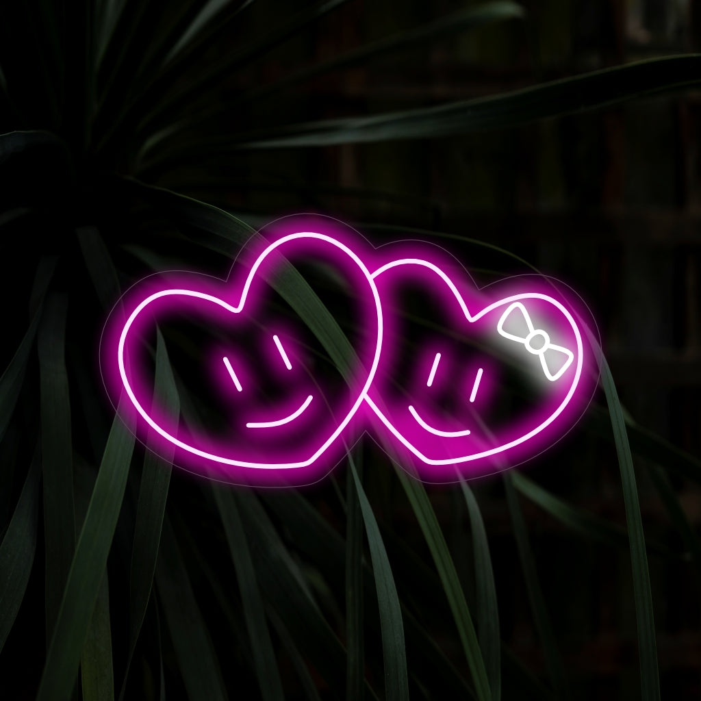"Cute Hearts Couple Neon Sign" straalt liefde en romantiek uit, een perfect decoratiestuk voor een romantische sfeer.