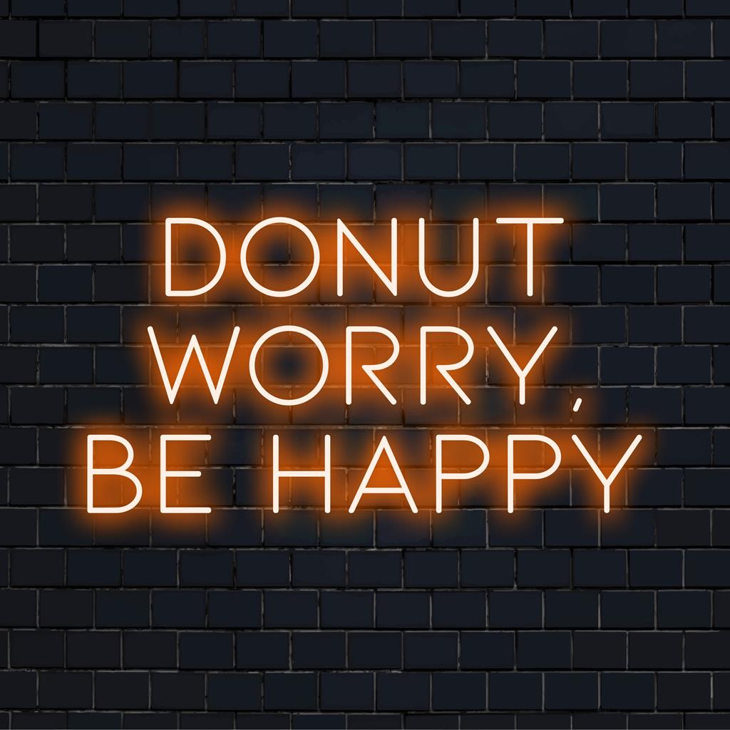 Kleurrijk led-bord met 'Donnut Worry, Be Happy'; een combinatie van neoncitaten en speelse lichtdecoratie. Op maat gemaakt en handgemaakt.