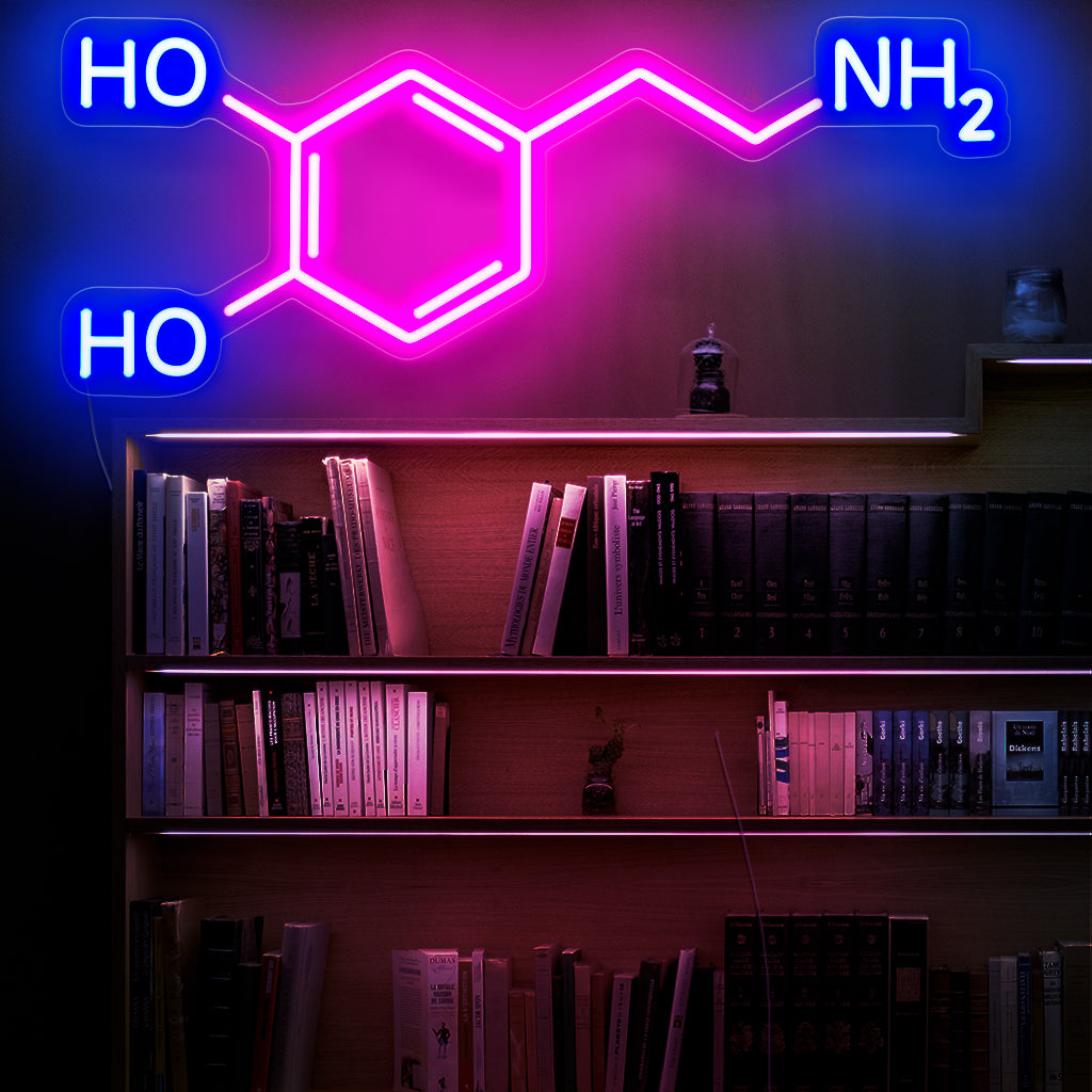 "Dopamine Molecule Neon Sign" licht op met een levendige gloed en viert de moleculaire structuur die geassocieerd wordt met plezier en beloning. Het is daarom perfect voor wetenschapsliefhebbers en intellectuele omgevingen.