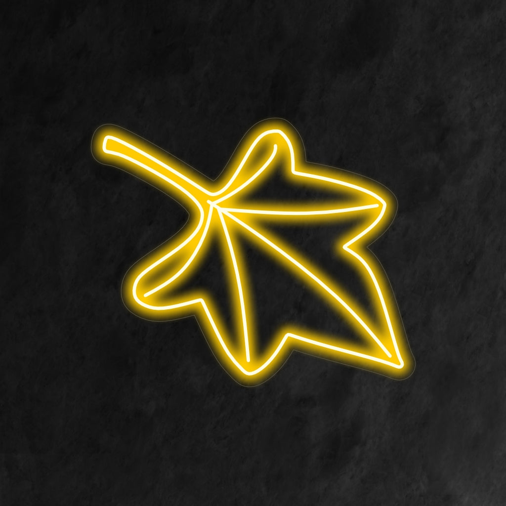 "Fall Leaf Neon Sign" licht op met warme herfsttinten, perfect voor seizoensgebonden decoraties en ruimtes die de schoonheid van de herfst vieren.