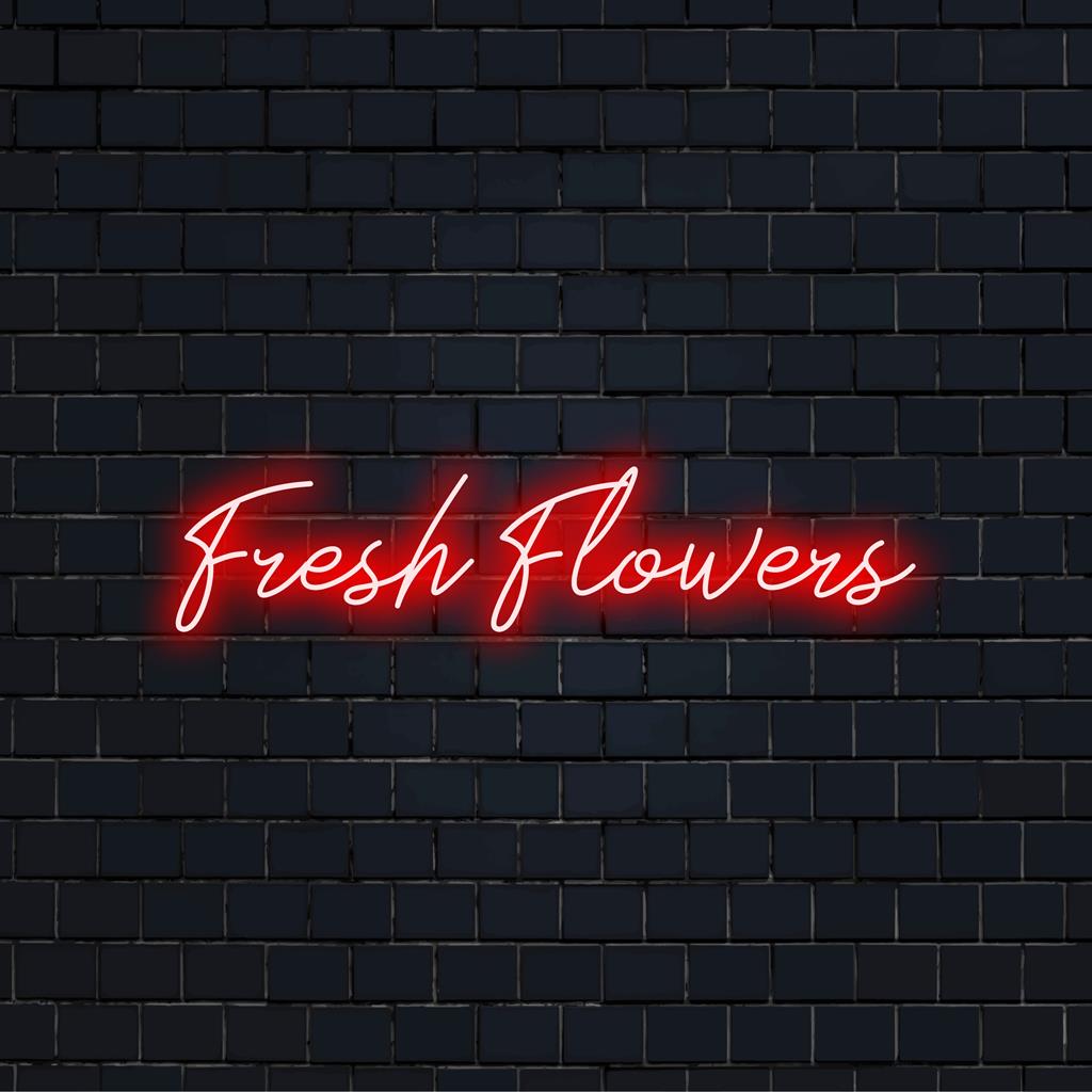 Verlicht Fresh Flowers neonbord met felle, op maat gemaakte LED-letters, perfect voor een levendig neoninterieur.