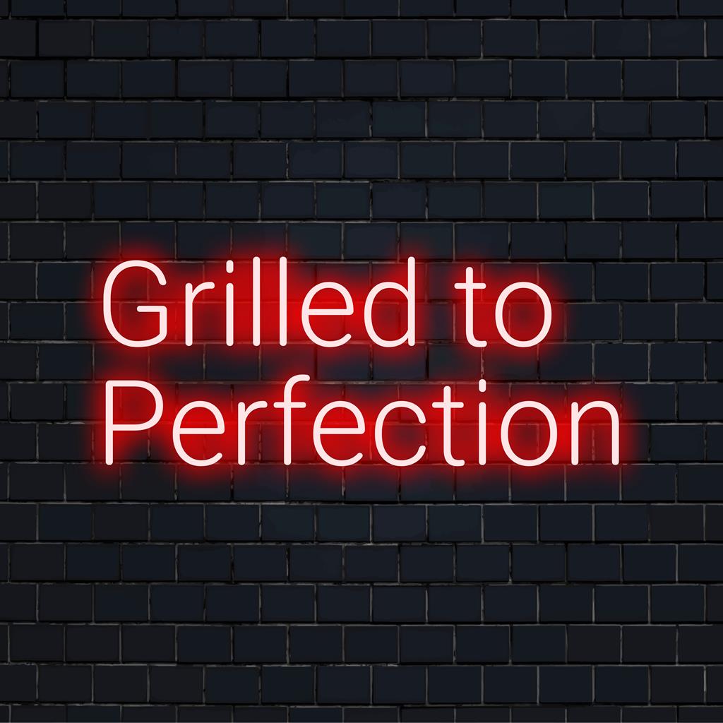 Een op maat gemaakt LED-neonbord met de tekst 'Grilled to Perfection' in een chique lettertype. Ideaal voor de inrichting van BBQ-liefhebbers, het voegt een gloeiende flair toe.