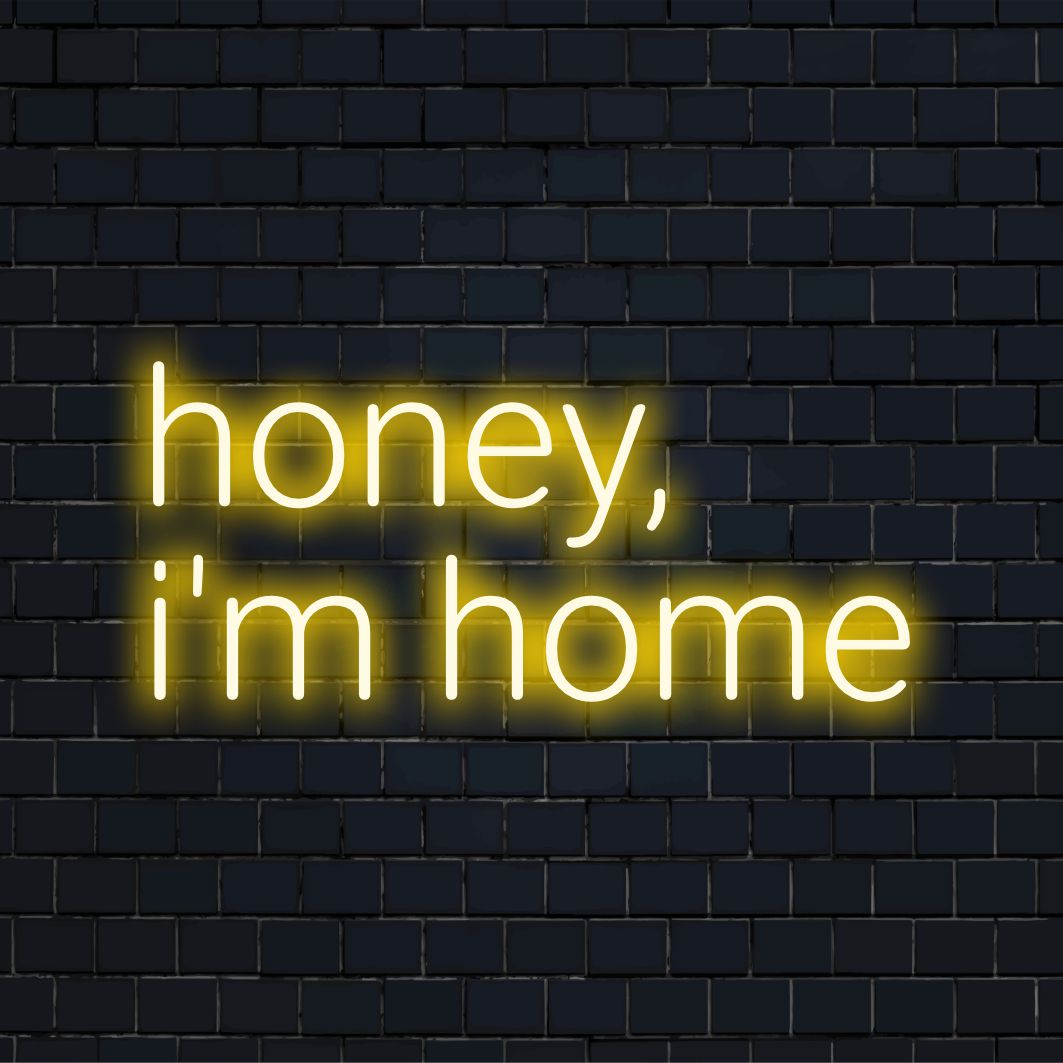 Verlichte neontekst met de tekst Honey I'm Home, ideaal voor gezellige ruimtes; betoverend LED-ontwerp op maat, perfecte neonmuurkunst.