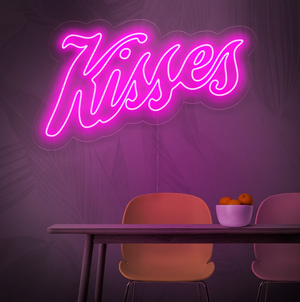Een verlicht neonbord met het woord 'Kisses', dat liefde en romantiek symboliseert en een vleugje passie en charme aan elke ruimte toevoegt