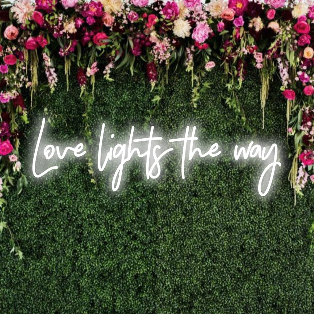 LED-neonbord met de tekst Love Lights The Way; combineert artistieke teksten met een warme gloed, ideaal voor inspirerende en verlichtende ruimtes.