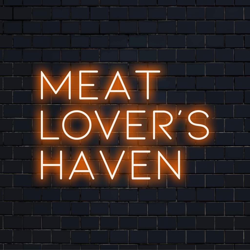 Op maat gemaakt LED-neonbord met de tekst Meat Lover's Haven. De combinatie van levendige neonkleuren zorgt voor een opvallend visueel effect.