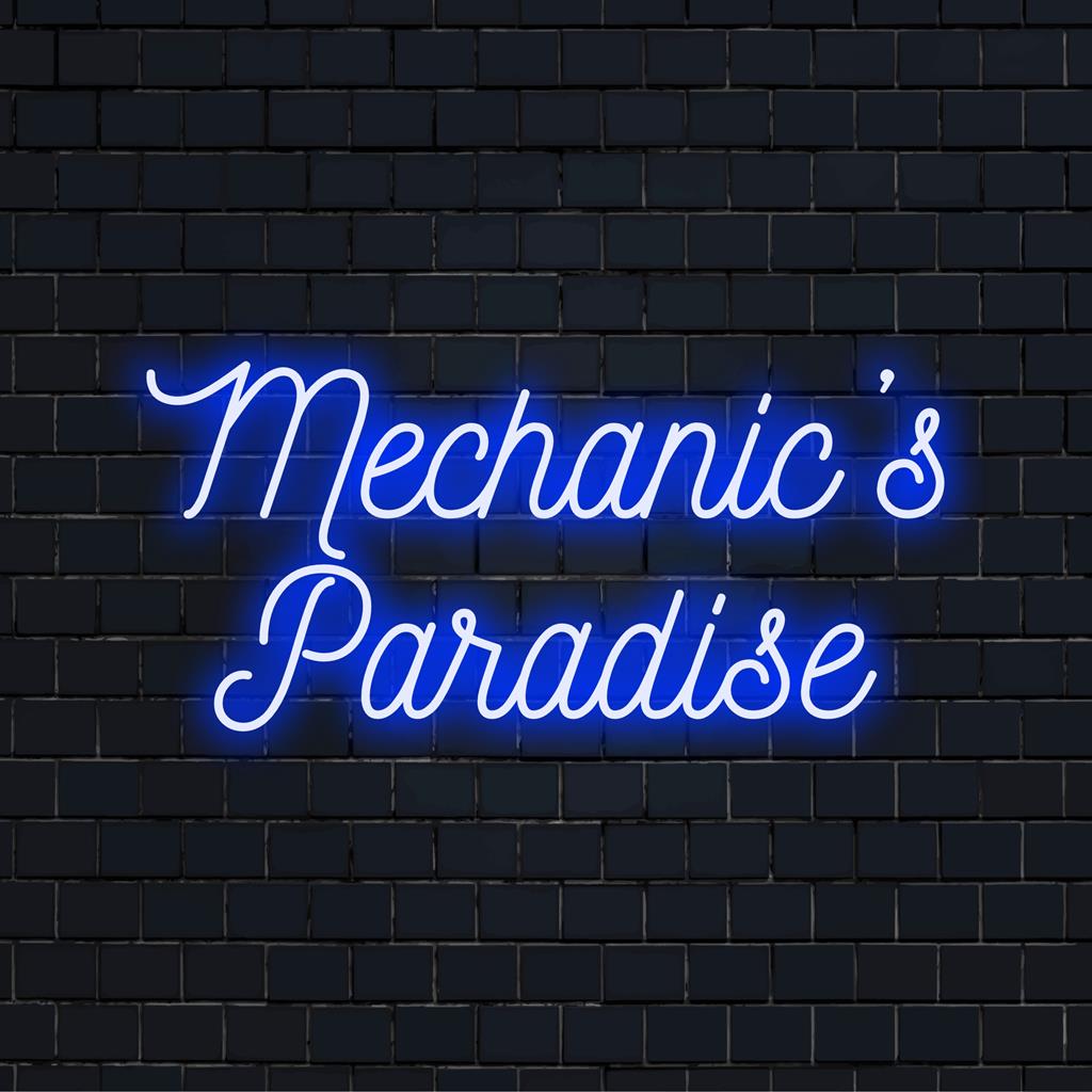 Een op maat gemaakt neonbord met de tekst Mechanic's Paradise, uitgevoerd in levendige leds. Ideaal voor gepersonaliseerde neondecoratie in een werkplaats.