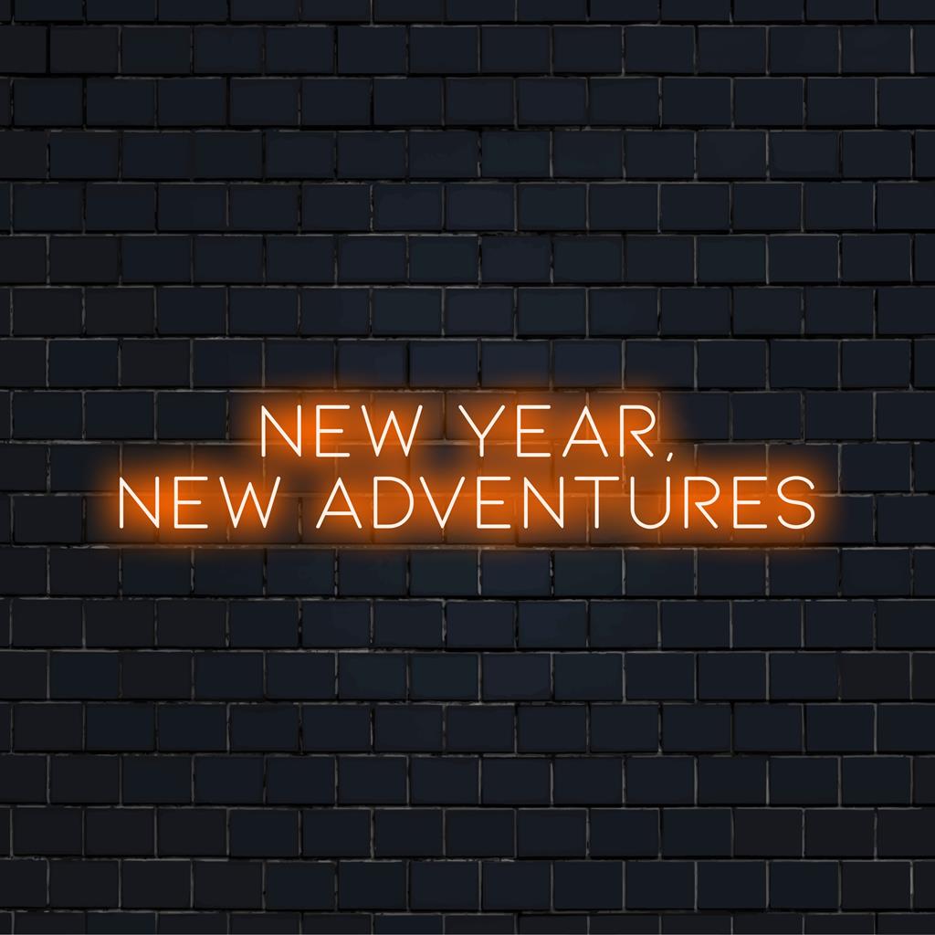 Levendig LED-neonbord met de tekst 'Nieuw jaar, nieuwe avonturen': perfect voor gepersonaliseerde wanddecoratie en een feestelijke sfeer.