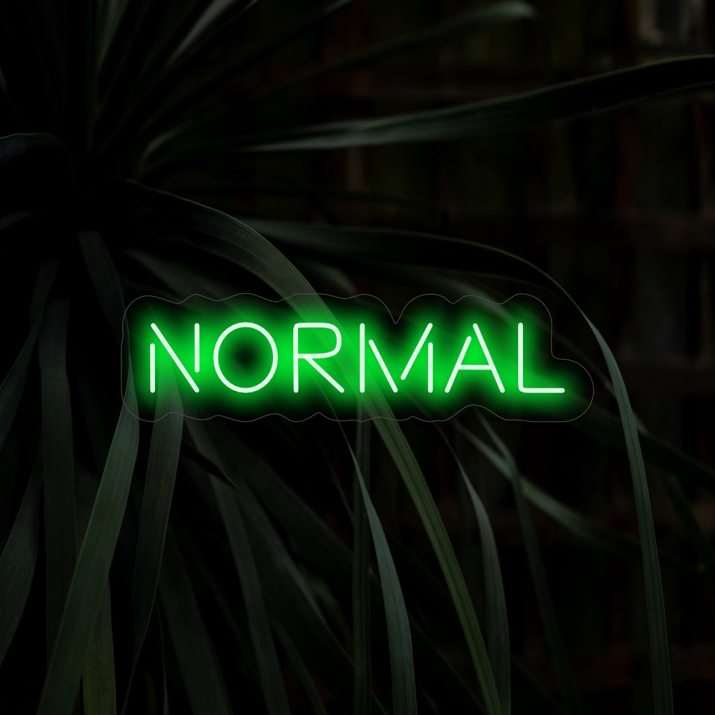"Normal Neon Sign" is een minimalistische en ingetogen toevoeging, perfect voor ruimtes die eenvoud en een rechttoe rechtaan esthetiek waarderen. Verlicht met subtiele elegantie!