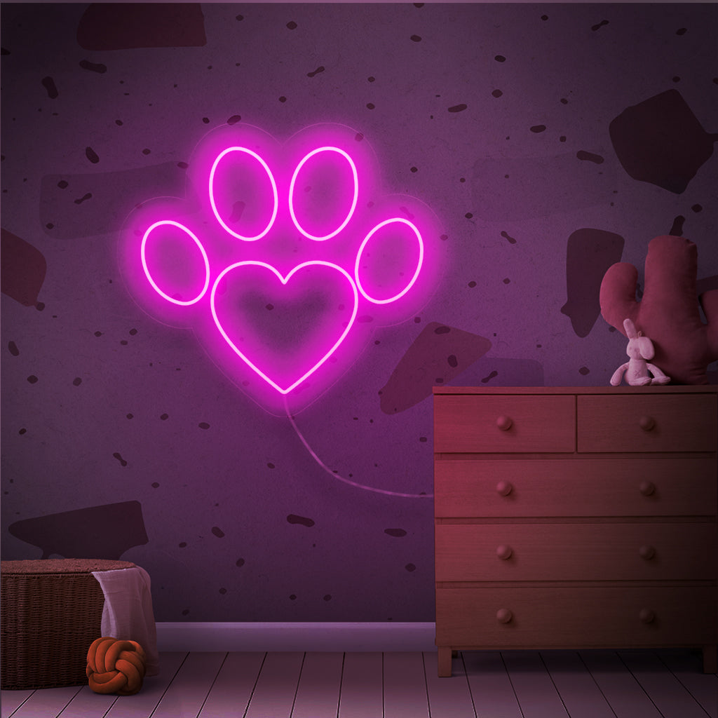 "Paw Neon Sign" is een charmante en hartverwarmende toevoeging, perfect voor ruimtes die de liefde voor huisdieren vieren. Verlicht met de warmte van een pootafdruk!
