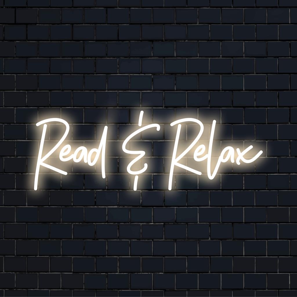 LED-neonreclame met 'Read Relax', een combinatie van zacht licht en modern design, om elke ruimte te verfraaien met sfeerverlichting en stijlvolle decoratie.