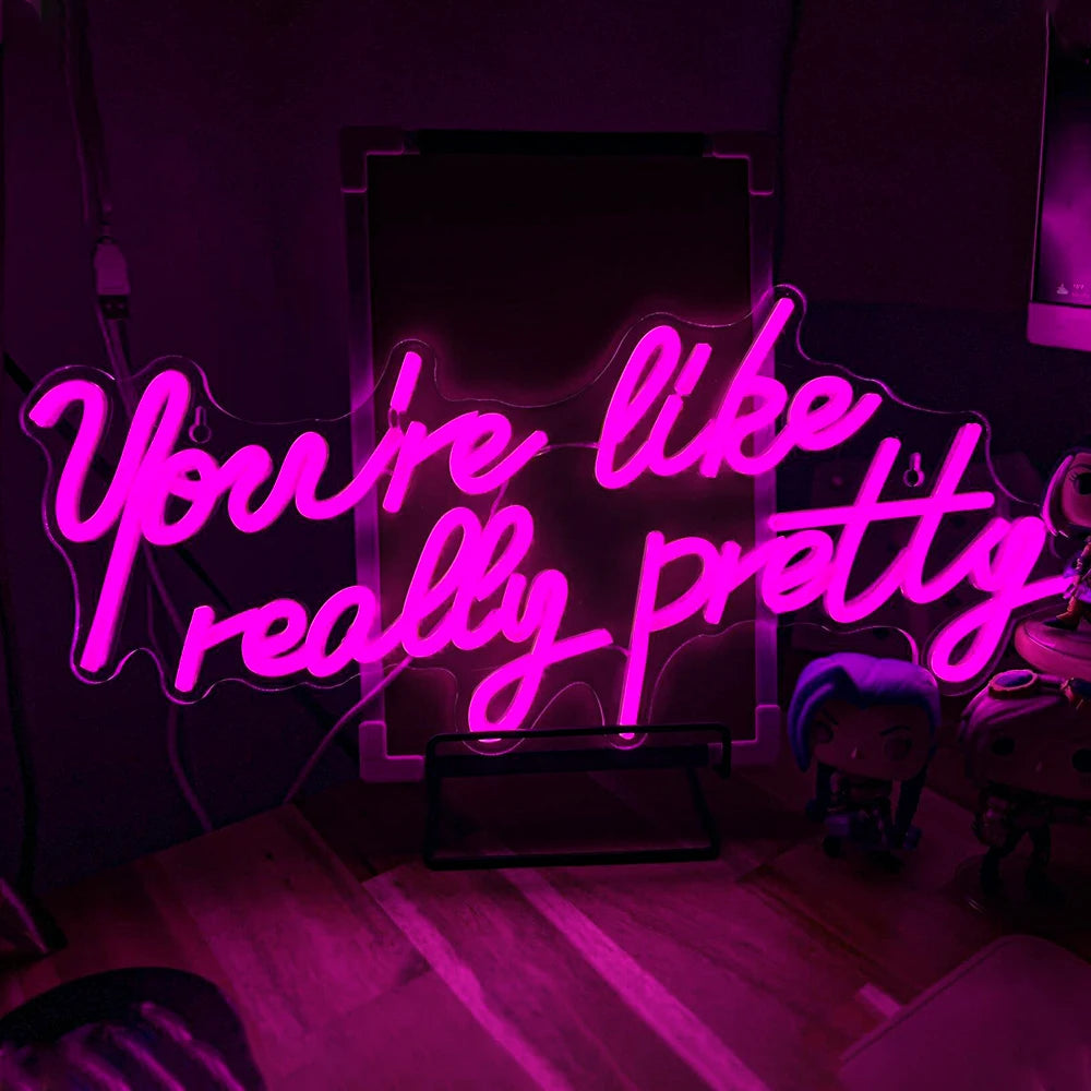 Een op maat gemaakt LED-neonbord met de tekst 'You're Like Really Pretty' in stijlvol, cursief handschrift.