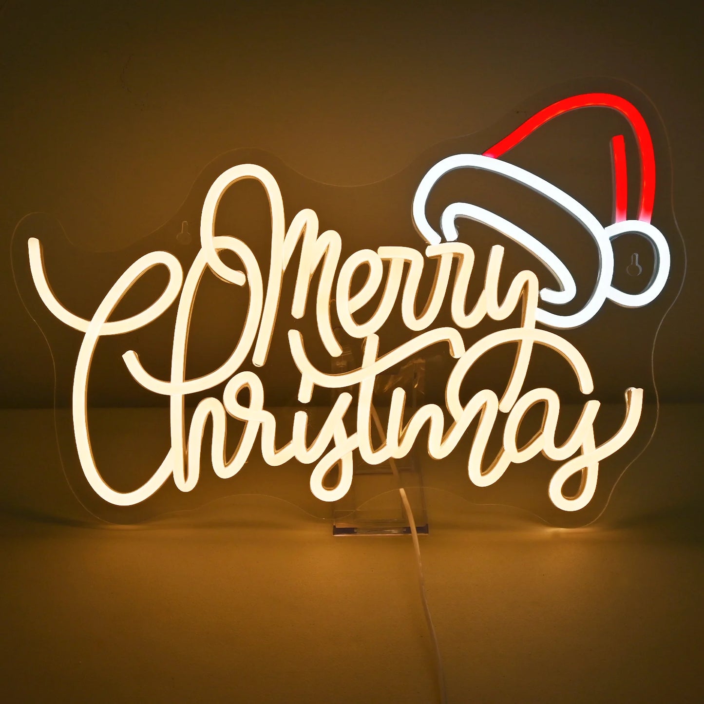 Een levendig LED-neonbord met de tekst "Merry Christmas" in een warme, gloeiende kleur.