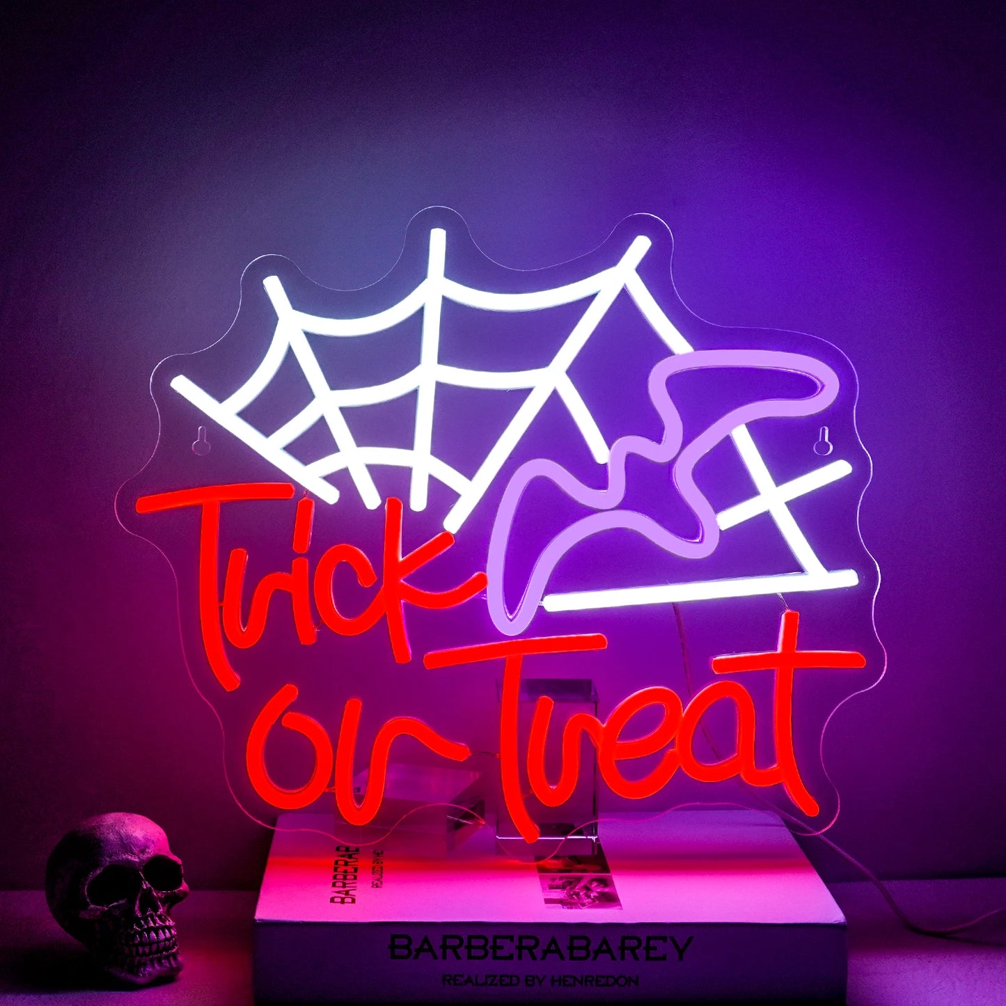 Een opvallend LED-neonbord met de tekst "Trick Or Treat" in opvallende, speelse letters.