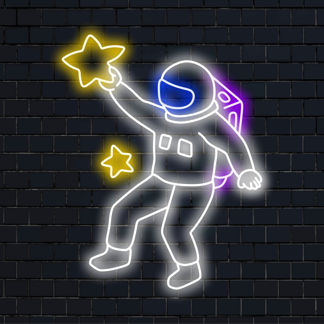 Een verlicht neonbord met een astronaut die een ster vasthoudt, symboliseert de verkenning en het wonder van de ruimte