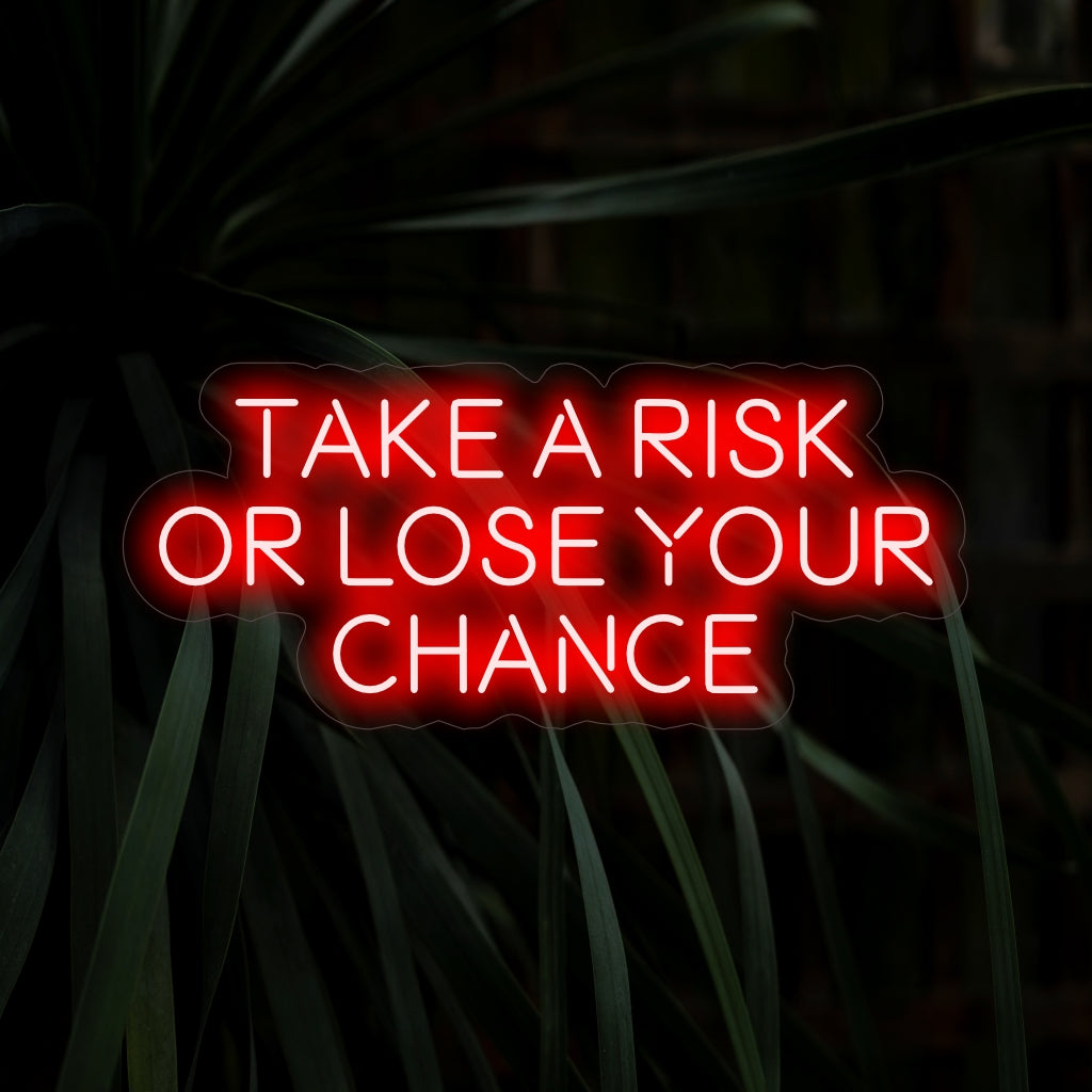 "Take a Risk or Lose Your Chance Neon Sign" inspireert met zijn krachtige boodschap en werpt een gedurfde gloed op die moed en het grijpen van kansen in uw ruimte aanmoedigt.