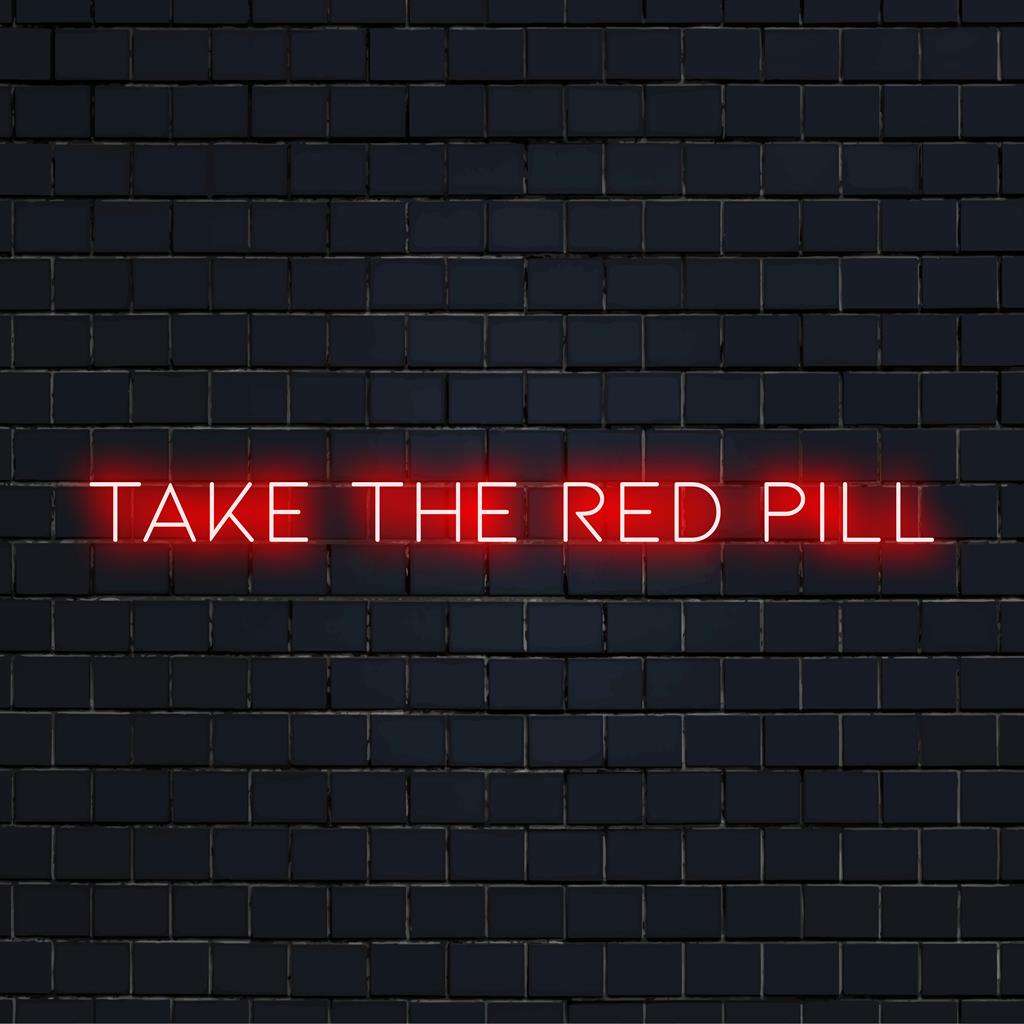 LED-neonreclame met de tekst 'Take The Red Pill' in levendig, opvallend licht. Perfect voor moderne wanddecoratie.