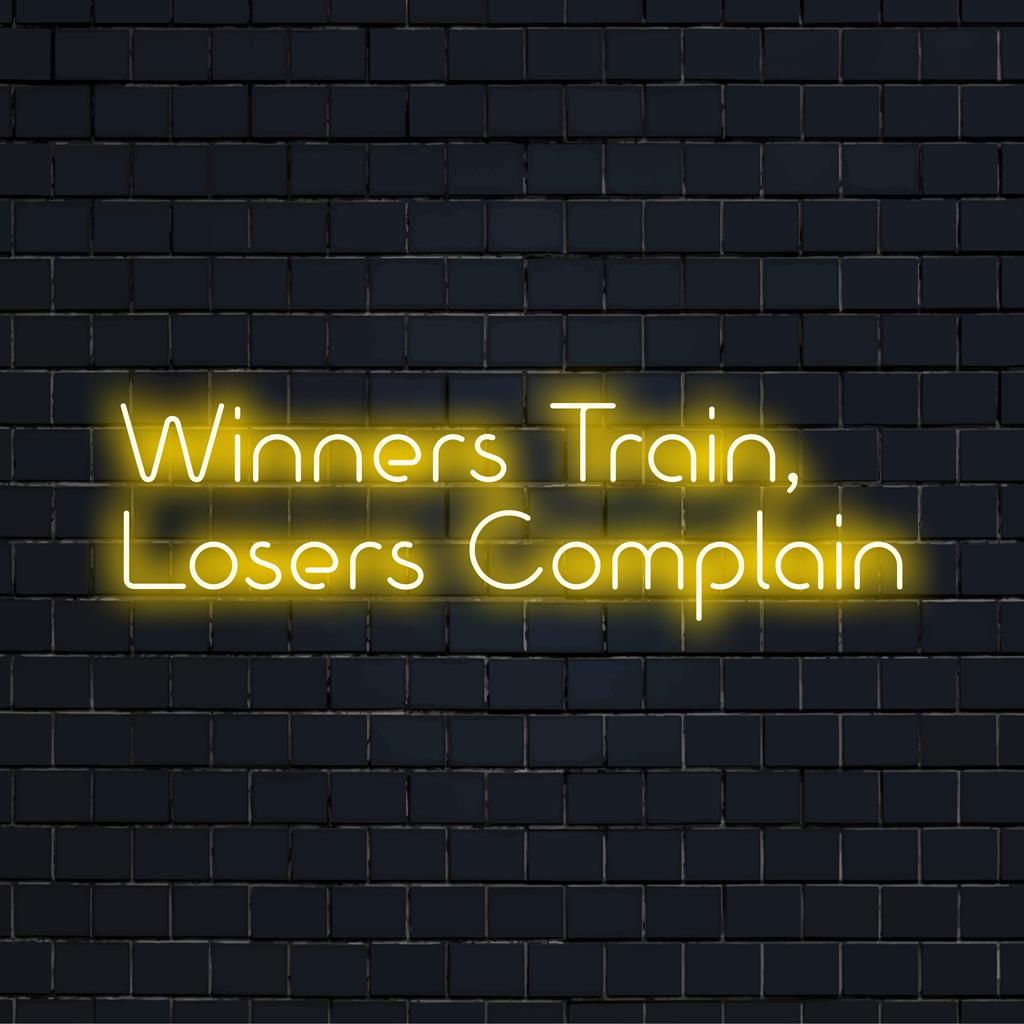 Levendig neonbord met de afbeeldingen Winner Train en Losers Complain met een coole gloed; ideaal voor motiverende LED-decoraties.