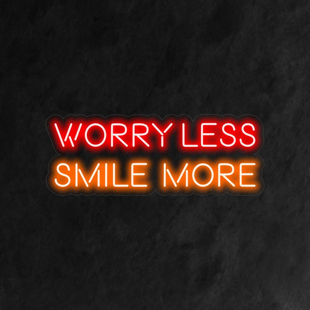 "Worry Less Smile More Neon Sign" is een positieve en opbeurende toevoeging aan je interieur. Een neonlamp die een zorgeloze houding en een stralende glimlach stimuleert.