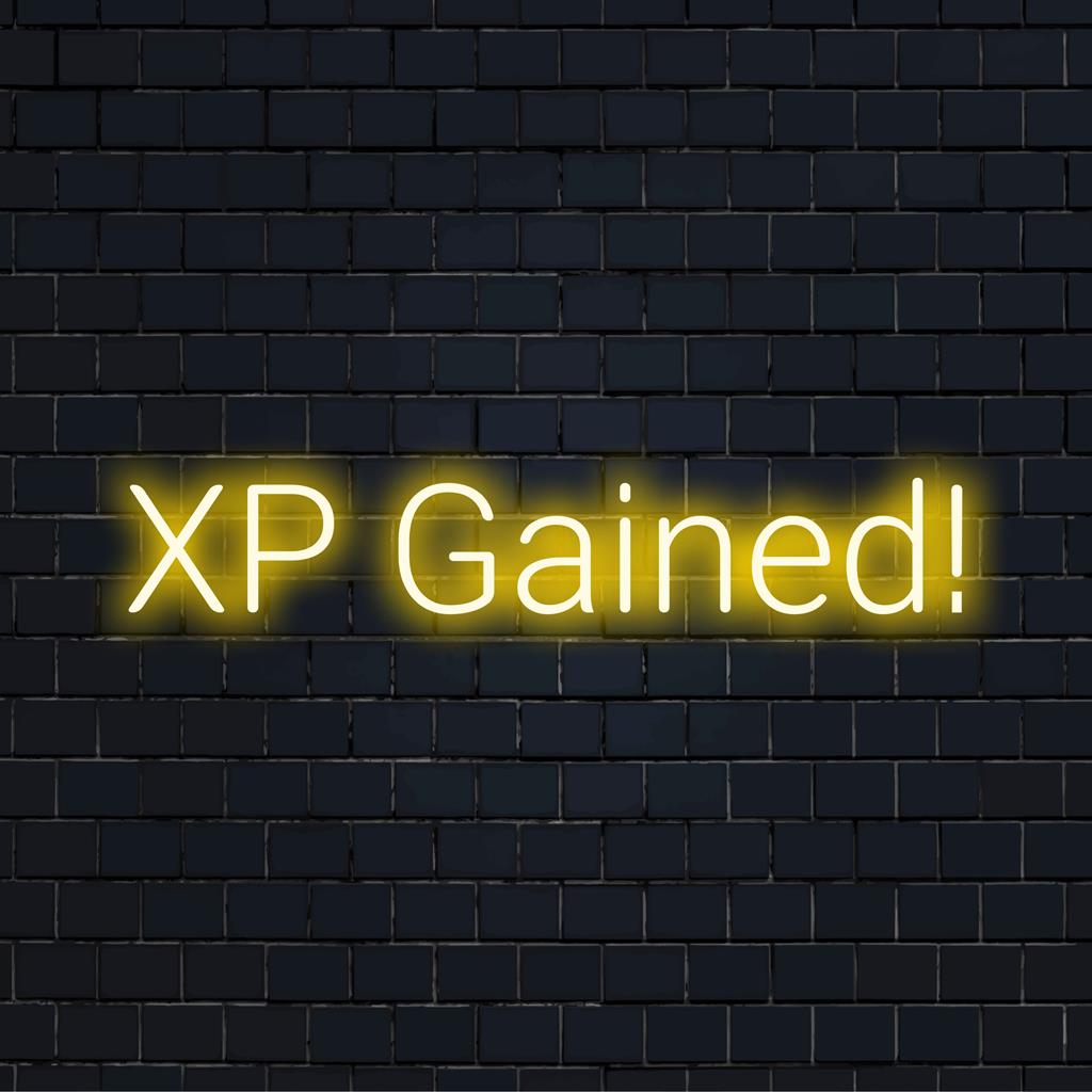 Op maat gemaakt LED-neonbord met de tekst XP Gained! in levendige kleuren; perfecte decoratie voor gameruimtes en moderne interieurs.