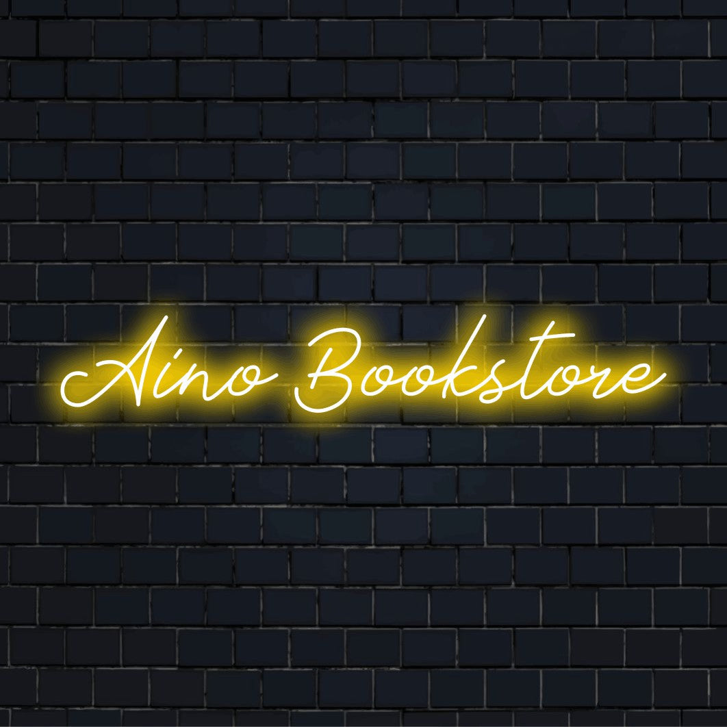 Aino Bookstore Custom Name Neon Sign, neon text light on dark brick wall