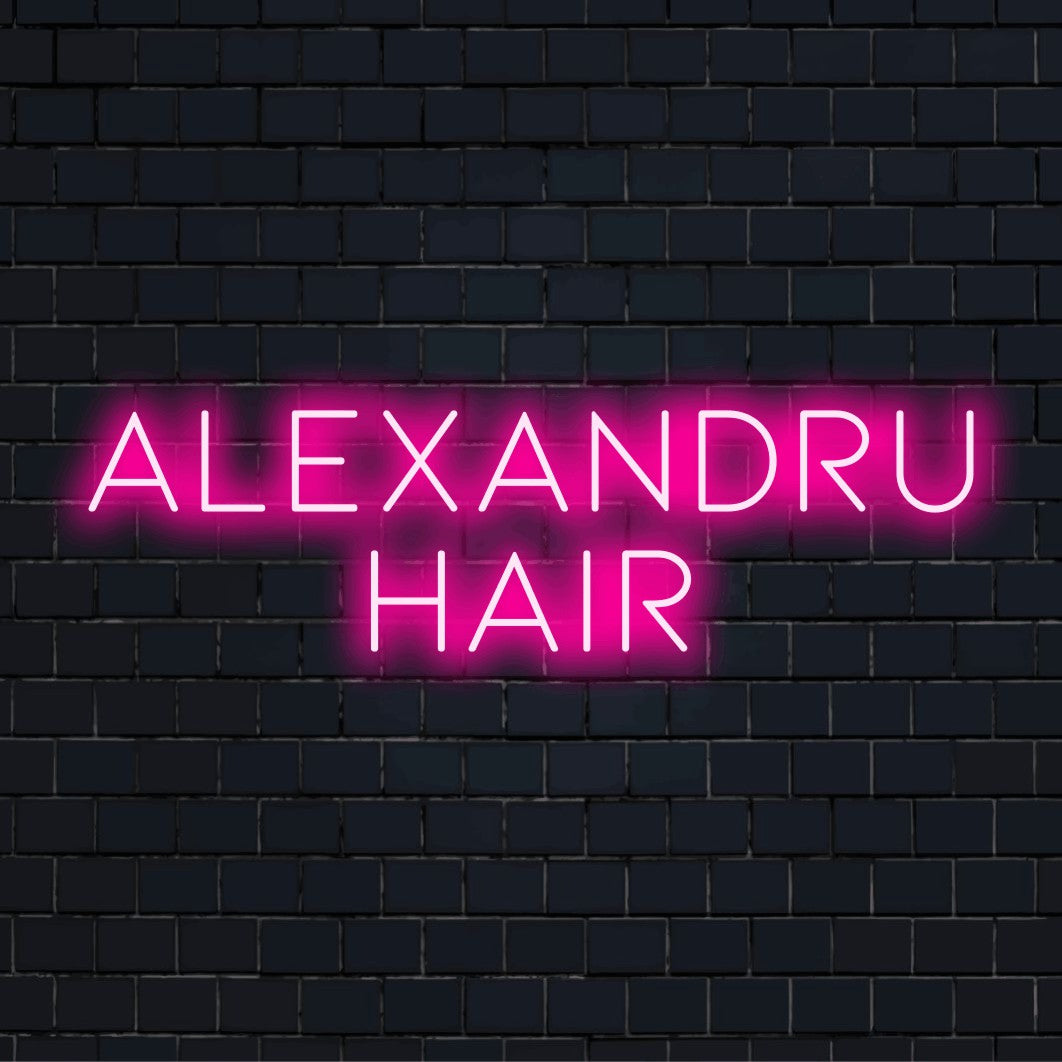 Alexandru Hair Custom Name Neon Sign, glowing neon text against brick backdrop