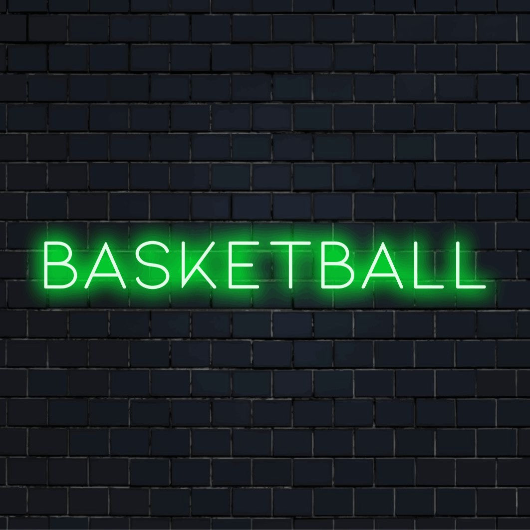 Basketball Neon Sign, bright neon lettering against black brick wall