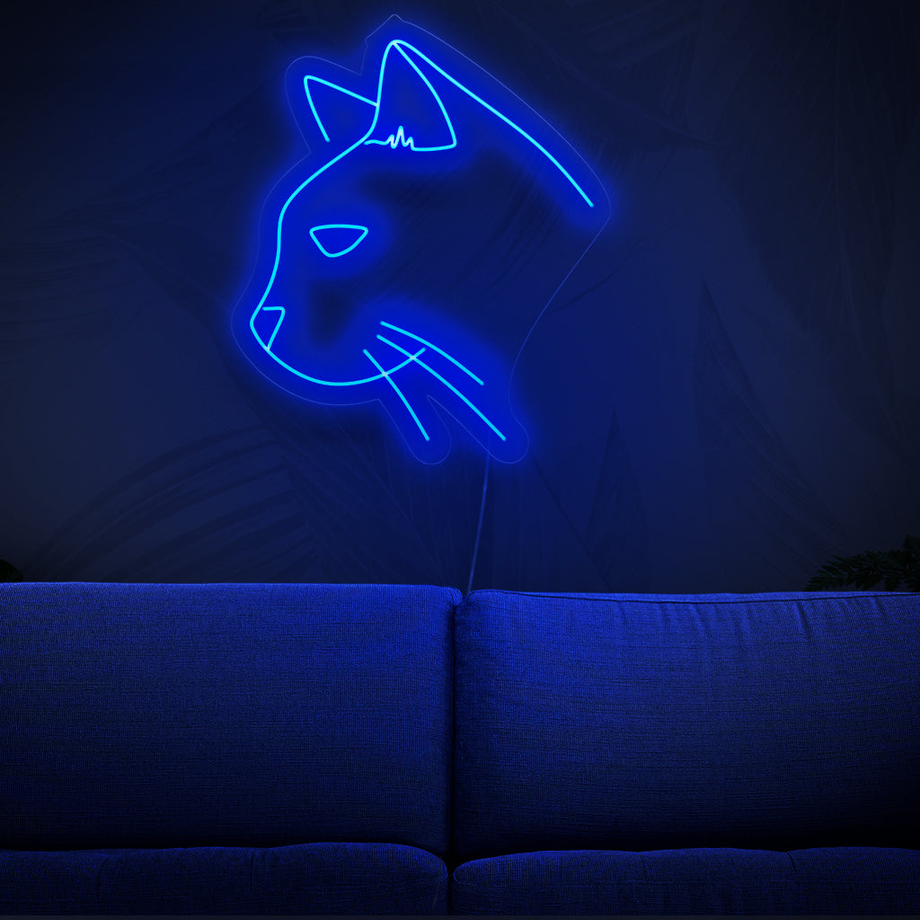 Een charmant neonbord in de vorm van een kat, perfect voor een decoratie met een dierenthema. Het licht straalt levendig en betoverend uit.