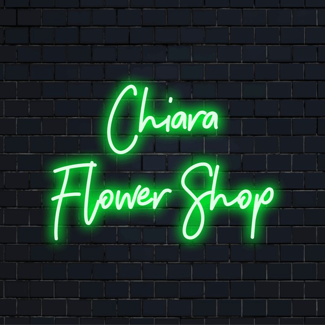 Chiara Flower Shop Personalized Neon Light with bright LED glow on black brick background