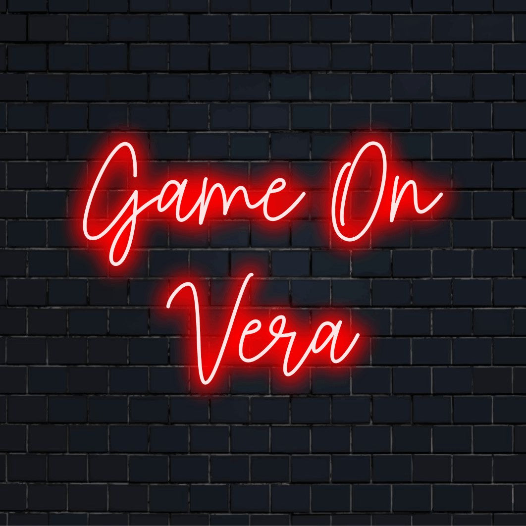 Game On Vera Custom Name Neon Sign, bright LED glow on dark brick background