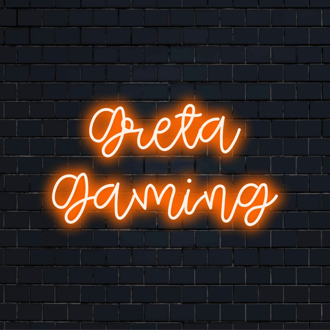 Greta Gaming Personalized LED Neon Sign, glowing wall decor on dark brick wall
