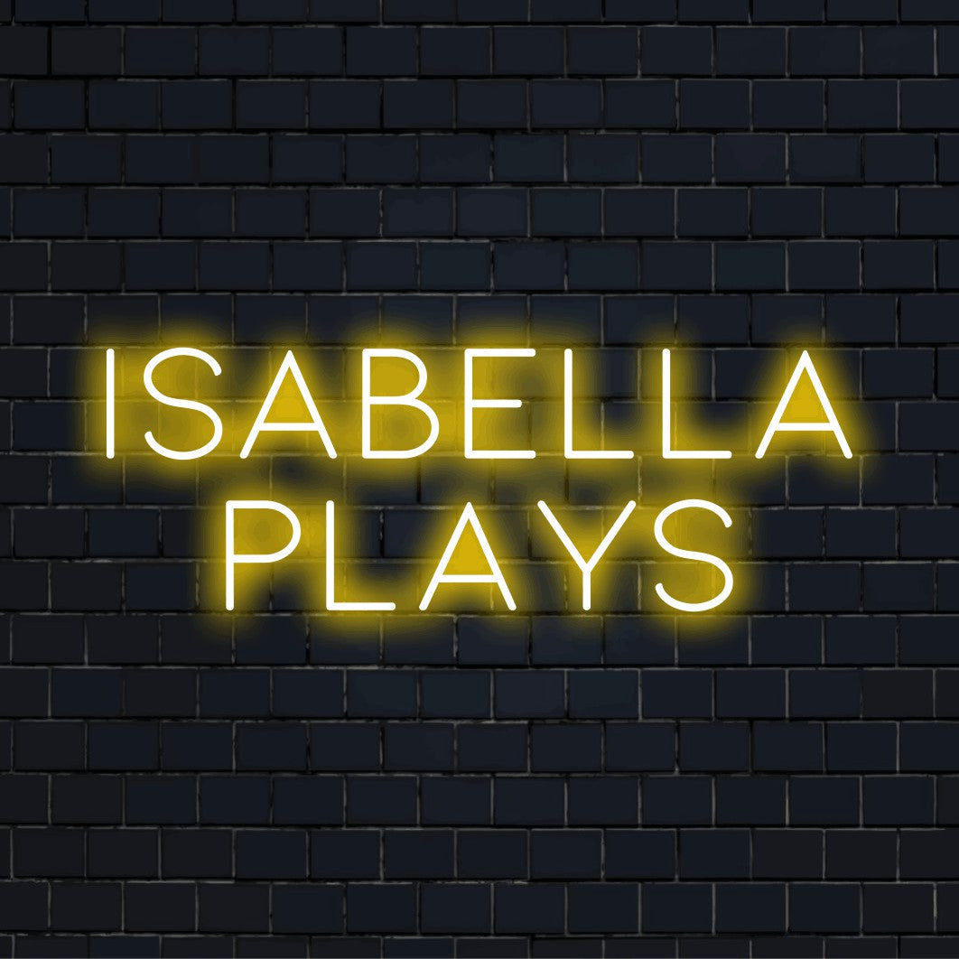 Isabella Plays Personalized LED Neon Sign, bright neon glow on dark brick wall