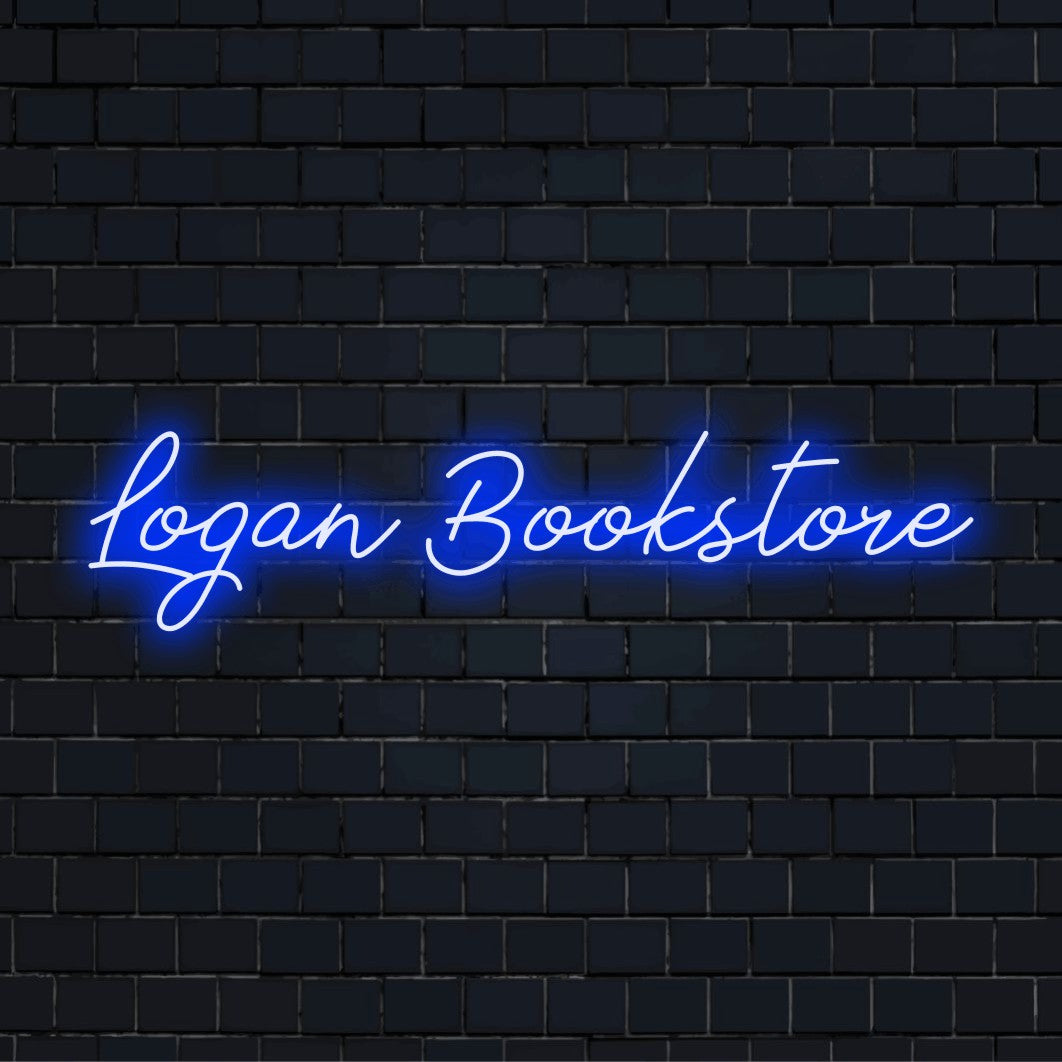 Logan Bookstore Personalized Neon Light with bright neon lettering on dark brick wall