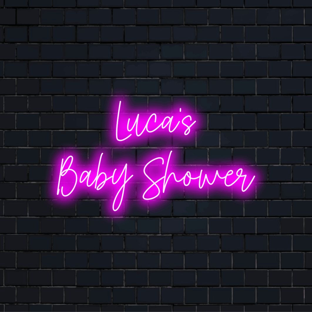 Luca_s Baby Shower Personalized LED Neon Sign, glowing lettering against brick backdrop