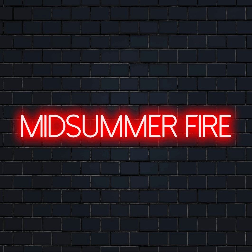Midsummer Fire LED Neon Sign, bright neon lettering on dark brick wall
