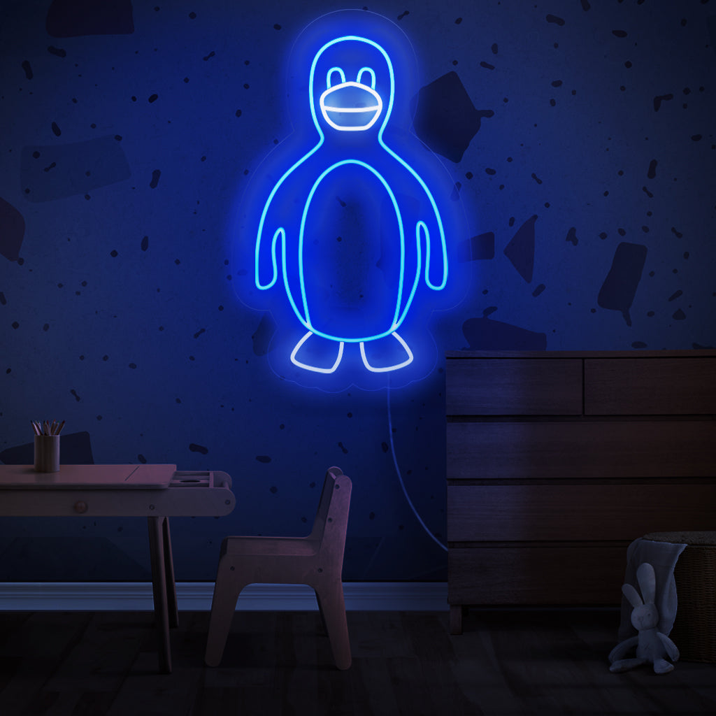 Het neonbord met pinguïns is een speelse toevoeging aan een arctisch thema-decor en werpt een charmant en energiek licht