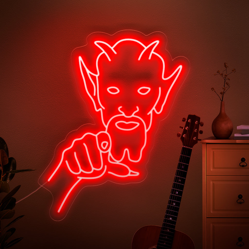 Een spookachtig neonbord met een dreigende demon die rechtstreeks naar u wijst, waardoor een gevoel van angst en ongemak ontstaat.