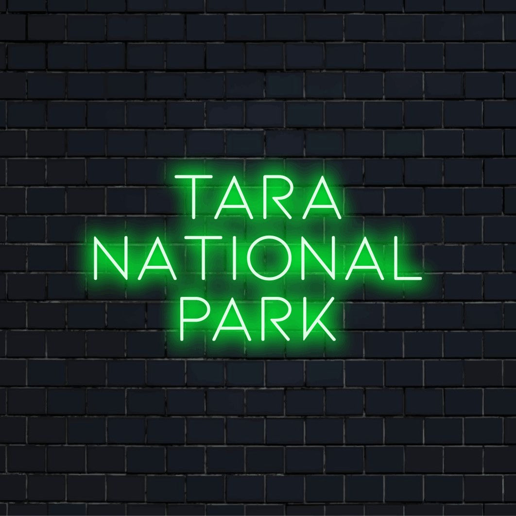 Tara National Park LED Neon Sign, bright LED glow on dark brick background