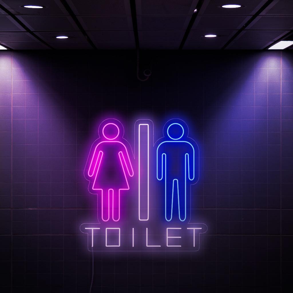 Een opvallend neonbord met een symbool van een vrouw en een man, samen met het woord 'Toilet'. Dit unieke bord voegt een vleugje stijl en functionaliteit toe aan toiletten, waardoor zowel mannen als vrouwen het toilet gemakkelijk kunnen vinden.