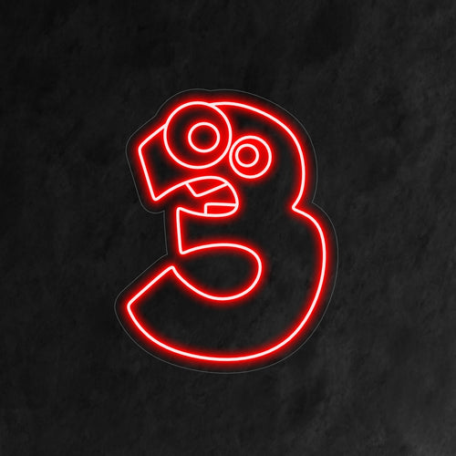 Op het "3rd Birthday Neon Sign" staat een schattig en komisch cijfer 3 afgebeeld, met karikaturale ogen en tanden. Het geeft een vrolijke touch aan de viering van de derde verjaardag van een kind.