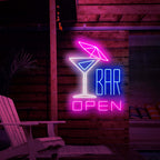 The photo shows a neon sign with a cocktail with an umbrella on the left and the text 'open bar' on the right. This neon sign is ideal for bars, both indoor and outdoor.