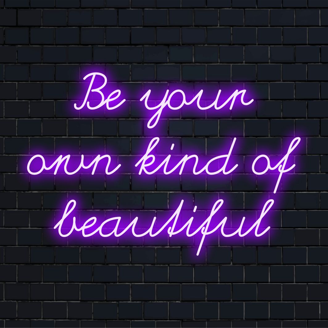 Op maat gemaakt LED-neonbord met de tekst Wees jouw eigen soort mooi, perfect als inspirerende wanddecoratie en gepersonaliseerde kunstboodschap.